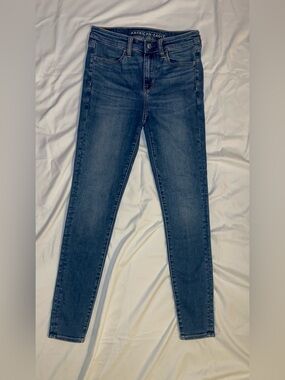 American Eagle Hi-Rise Jegging Jeans 4 Regular Next Level Stretch Medium Wash